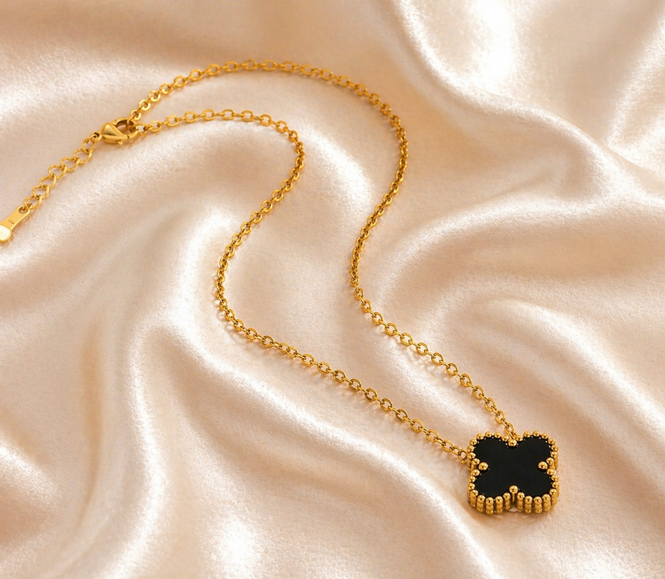 Gold Plated Chain With A Black Clover Pendant